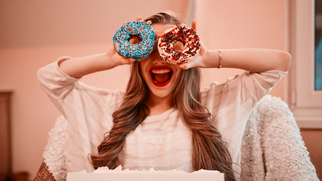 Woman with donuts in front of her eyes-Reduce Sugar Cravings Naturally