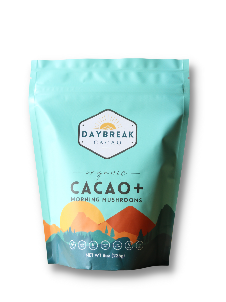 Teal bag of Daybreak Cacao + Morning Mushrooms Coffee Replacement with white background